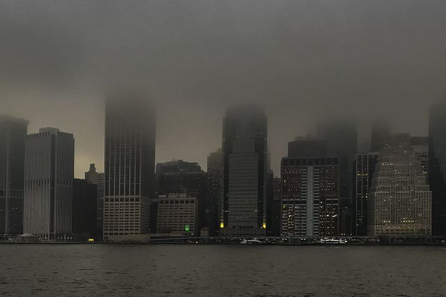 a foggy lower Manhattan skyline
